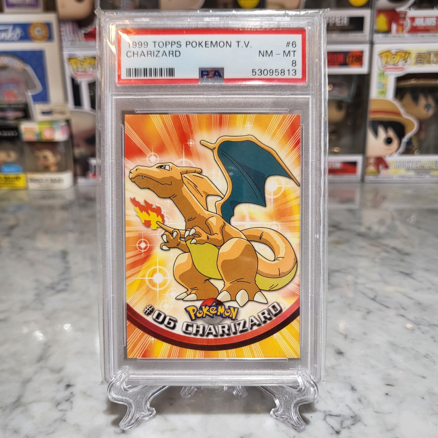 Pokemon TOPPS - 1999 Charizard [PSA 8]